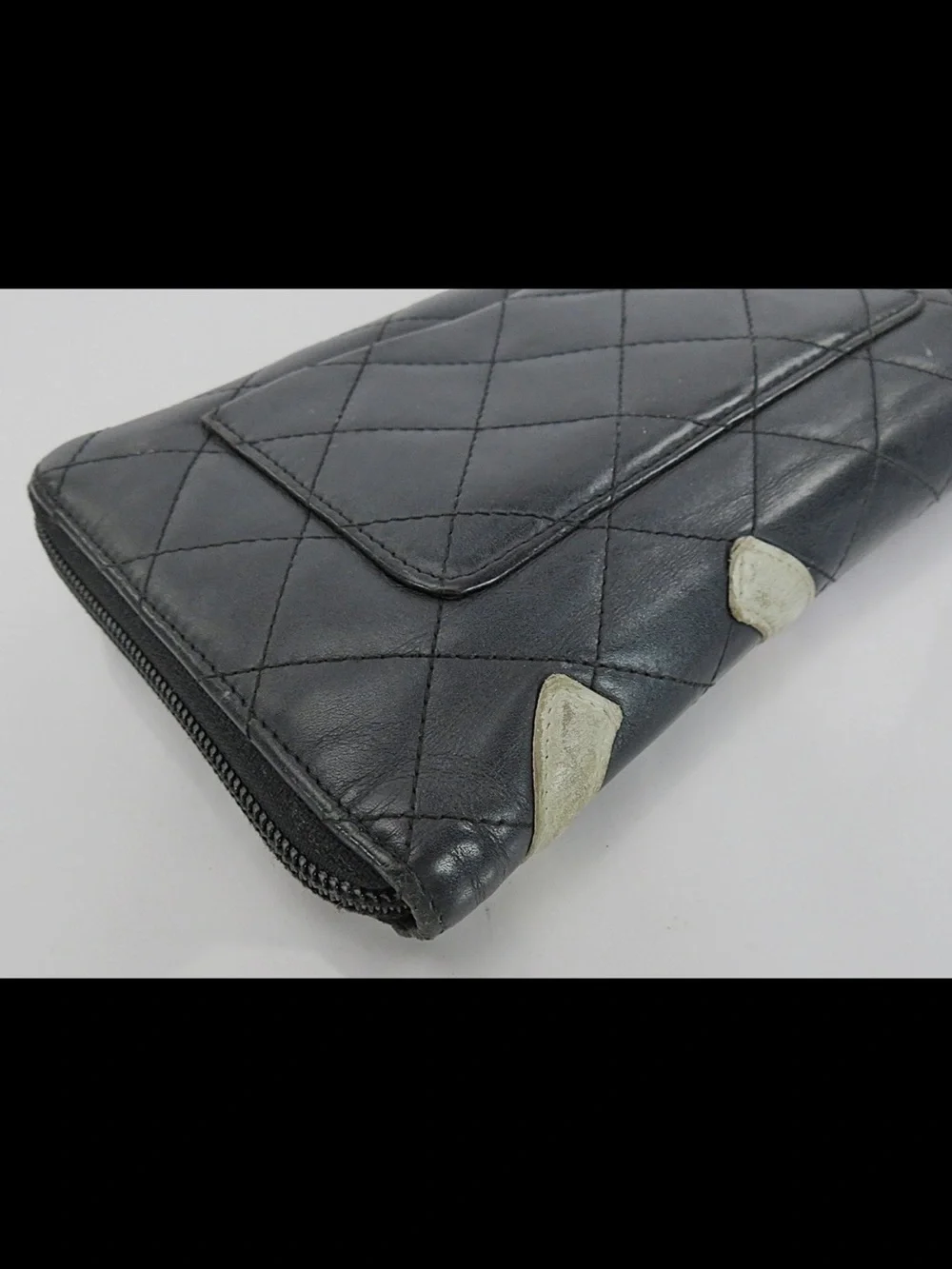 CHANEL Black Quilted Leather Zip Wallet with White CC Patch